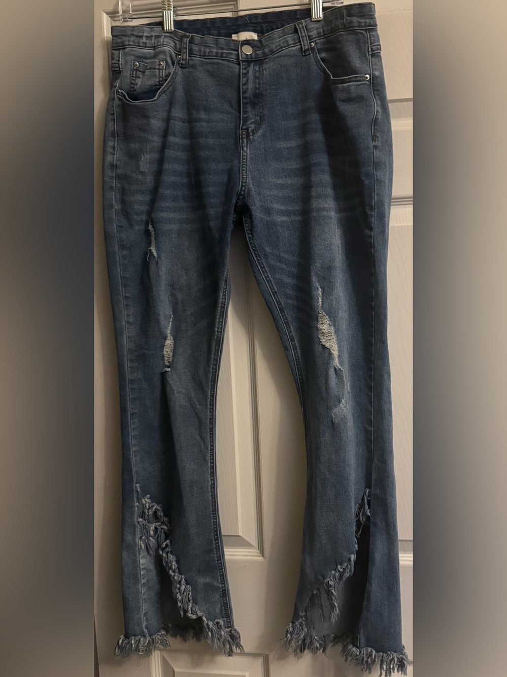 Hayden Light Blue High-Rise Distressed Jeans with cute front open frayed hem